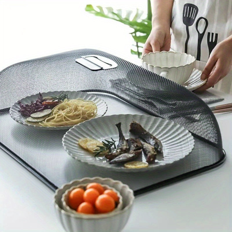 Mesh food cover made of stainless steel for use on indoor and outdoor tables, ideal for kitchen storage and organization. Can also be used as a lid for canister containers and other kitchen accessories.