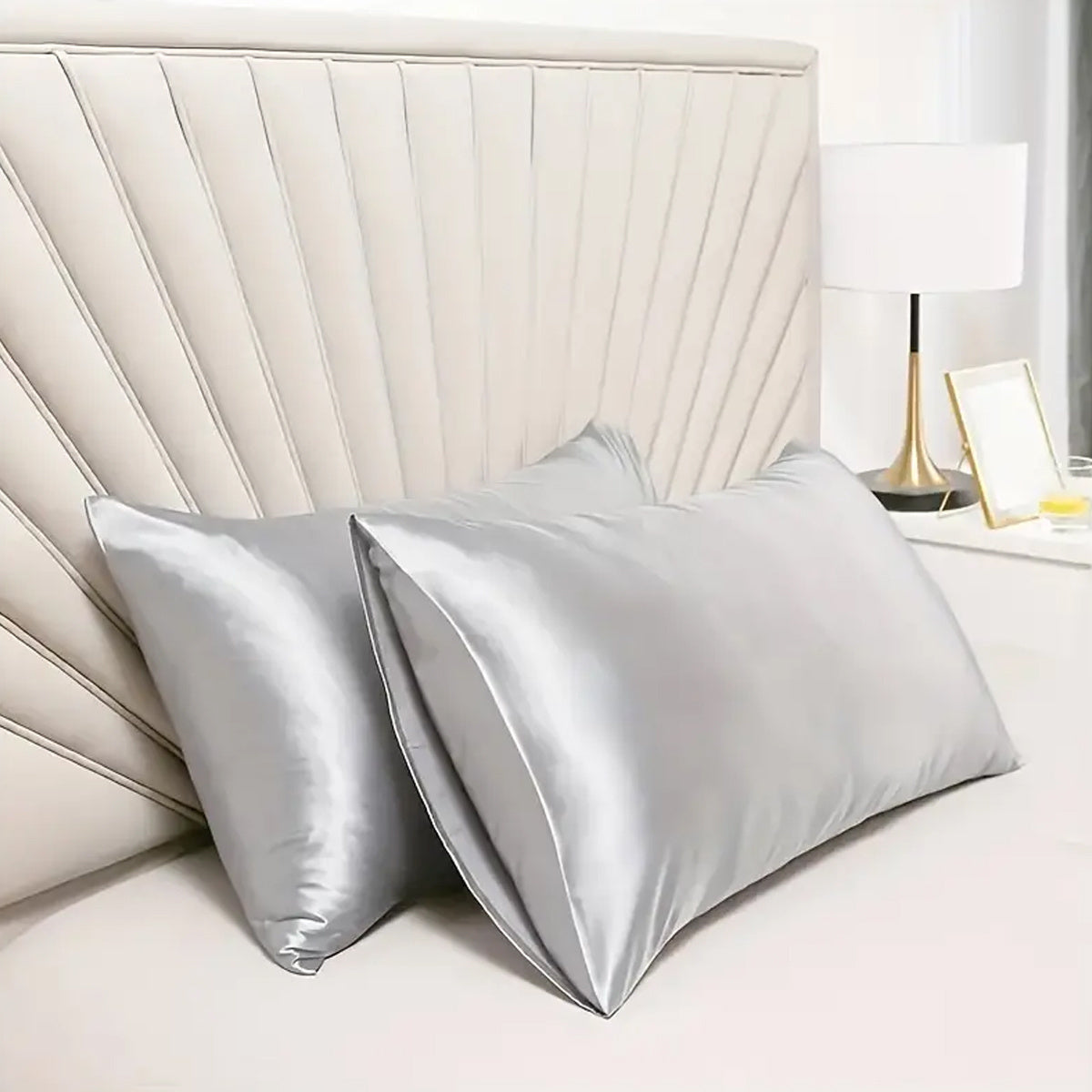 Machine washable pillowcase made of luxurious silky soft material with a breathable, skin-friendly cooling feel. Features a solid color design with envelope closure.