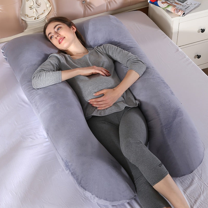 Soft and supportive U-shaped pregnancy pillow designed for maternity support. This portable, hand-washable polyester lumbar cushion provides full body comfort. The perfect gift for expectant mothers.