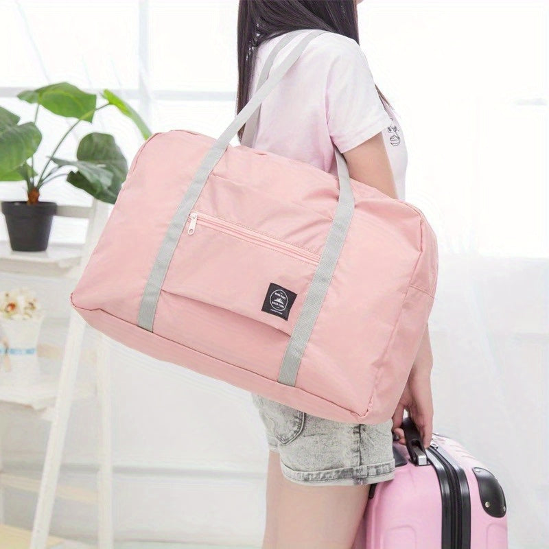 Foldable nylon travel bags with large capacity for women and waterproof handbags for men.