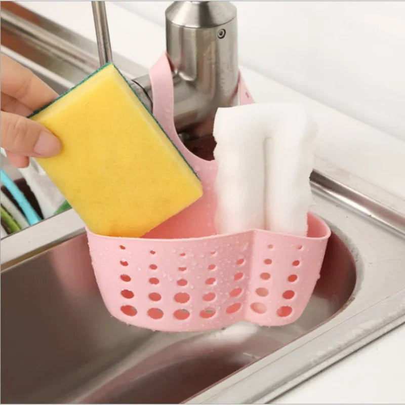 Space-saving design kitchen sink caddy made of adjustable plastic, perfect for soap and sponge storage. Hang it on your sink for easy access and keep your kitchen organized.