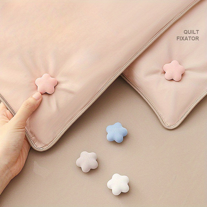 One piece of adorable star and plum blossom shaped comforter clips designed to securely hold duvets in place, prevent slipping, and keep quilts firmly in the corners. These blanket grippers come in pink and should be spot-cleaned only.