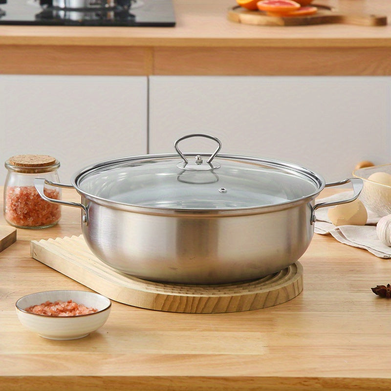 Large capacity stainless steel hot pot with lid, perfect for home and commercial use. This induction-compatible cookware set is ideal for making clear soup. The magnetic base allows for use on induction stovetops without the need for a power supply.