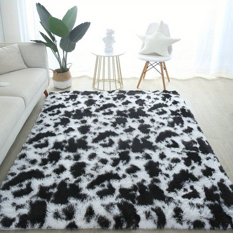 Indulge in the luxury of our PV Velvet Indoor Plush Area Rugs, featuring a sleek Black and White Cow Geometric design. These Non-Slip Large Rugs are perfect for adding a cozy touch to your Living Room, Bedroom, Entryway or Hallway. Experience the