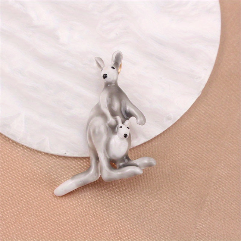 This elegant enamel kangaroo brooch is a cute and unique piece of novelty jewelry in the shape of a cartoon animal. Perfect for both men and women, it features an irregular simulation modeling design that is sure to stand out on any suit coat as a