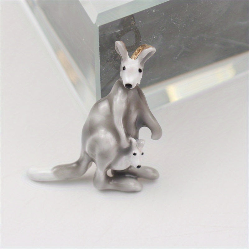 This elegant enamel kangaroo brooch is a cute and unique piece of novelty jewelry in the shape of a cartoon animal. Perfect for both men and women, it features an irregular simulation modeling design that is sure to stand out on any suit coat as a