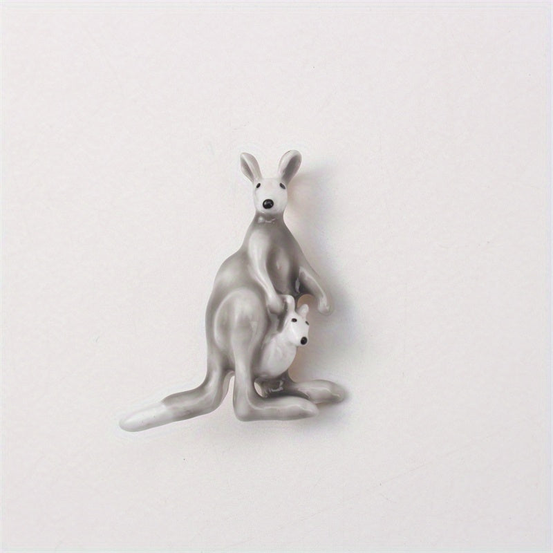 This elegant enamel kangaroo brooch is a cute and unique piece of novelty jewelry in the shape of a cartoon animal. Perfect for both men and women, it features an irregular simulation modeling design that is sure to stand out on any suit coat as a