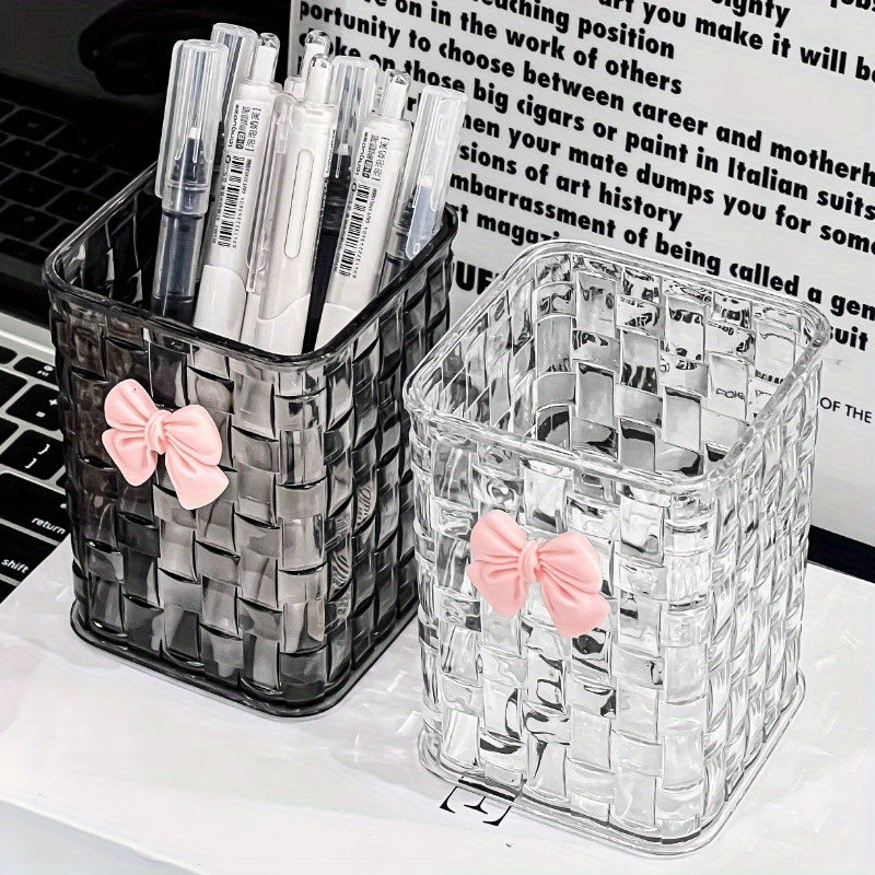 Clear acrylic desk organizer with bow accent for office supplies.