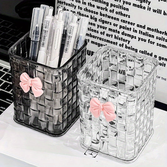 Clear acrylic desk organizer with bow accent for office supplies.