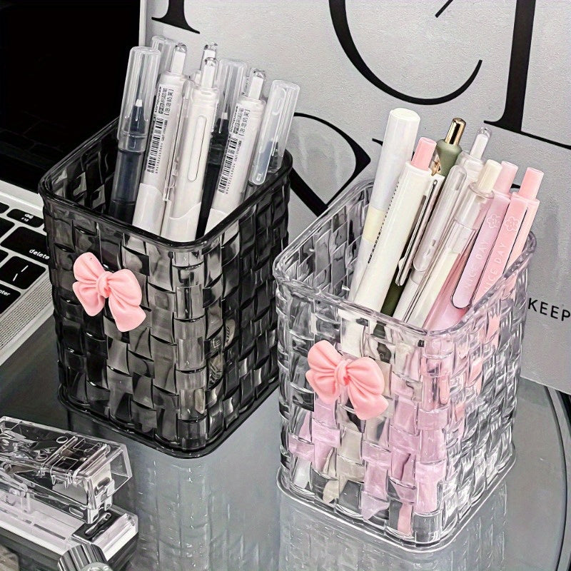 Clear acrylic desk organizer with bow accent for office supplies.