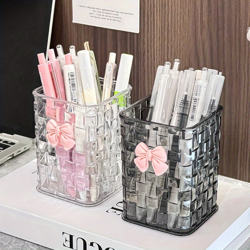 Clear acrylic desk organizer with bow accent for office supplies.