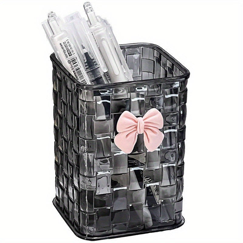 Clear acrylic desk organizer with bow accent for office supplies.