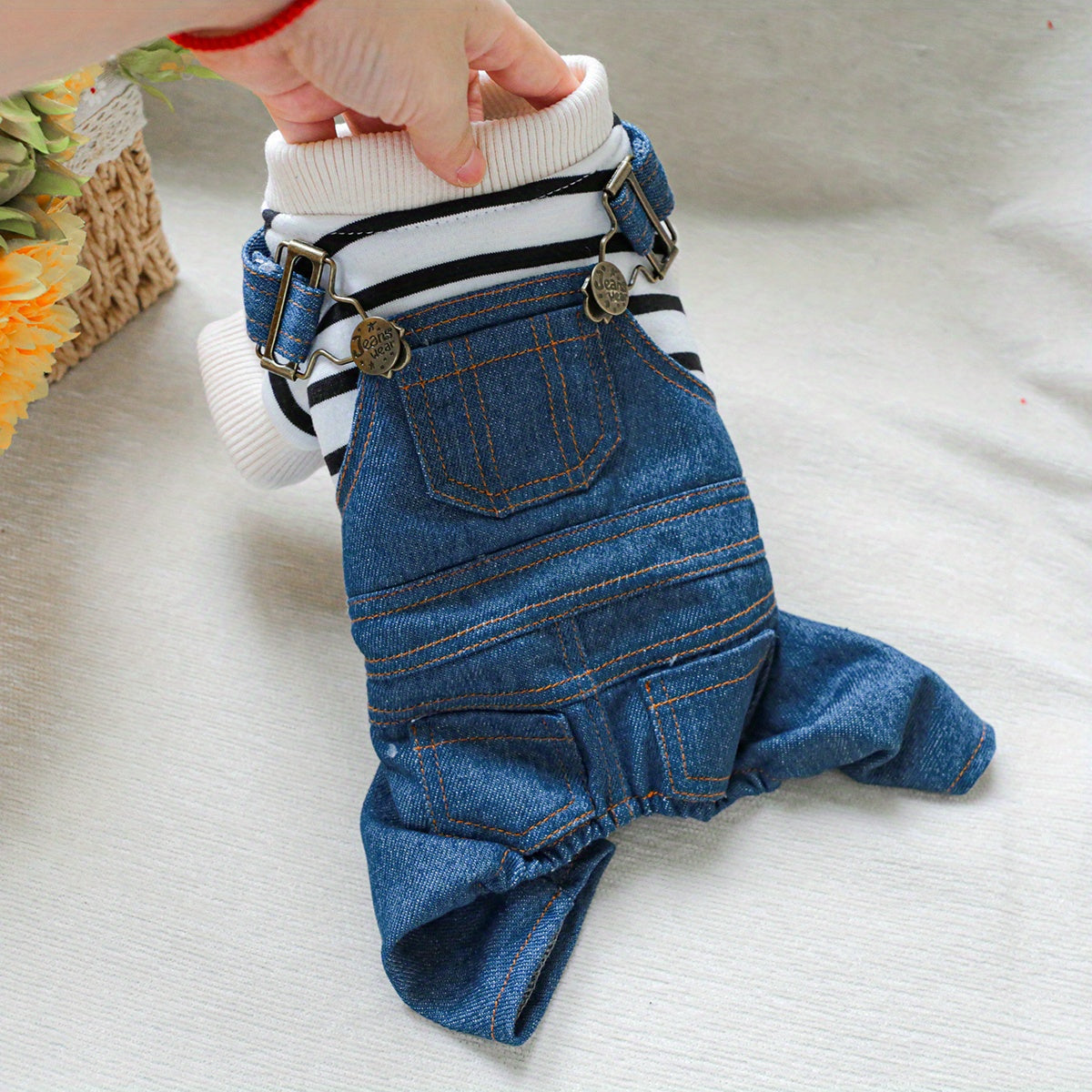 Striped denim jumpsuit for small breeds like Pomeranians and Yorkies, with easy snap closure. Ideal for all seasons.