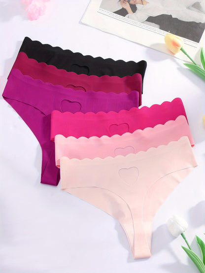 Set of 6 low-rise thong panties for women with heart design, seamless, sexy, and wave pattern edge with hollow heart details.