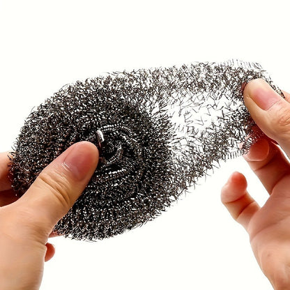 6 reusable stainless steel scrubbers for cleaning dishes, pots, and more in home and restaurant kitchens.