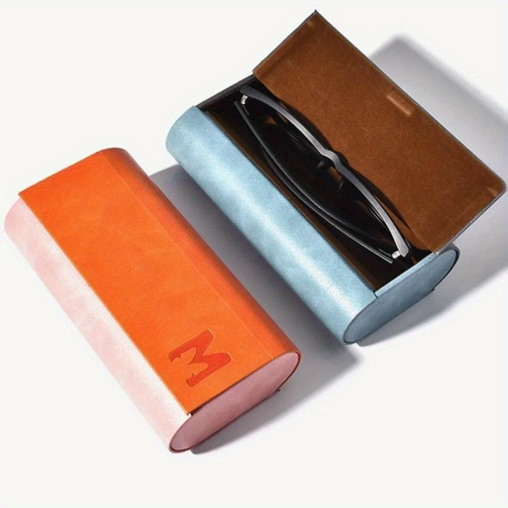 Stylish double-layer glasses case made from durable faux leather. This portable and fashionable case can hold 2 pairs of glasses and comes in scratch-resistant blue or orange.