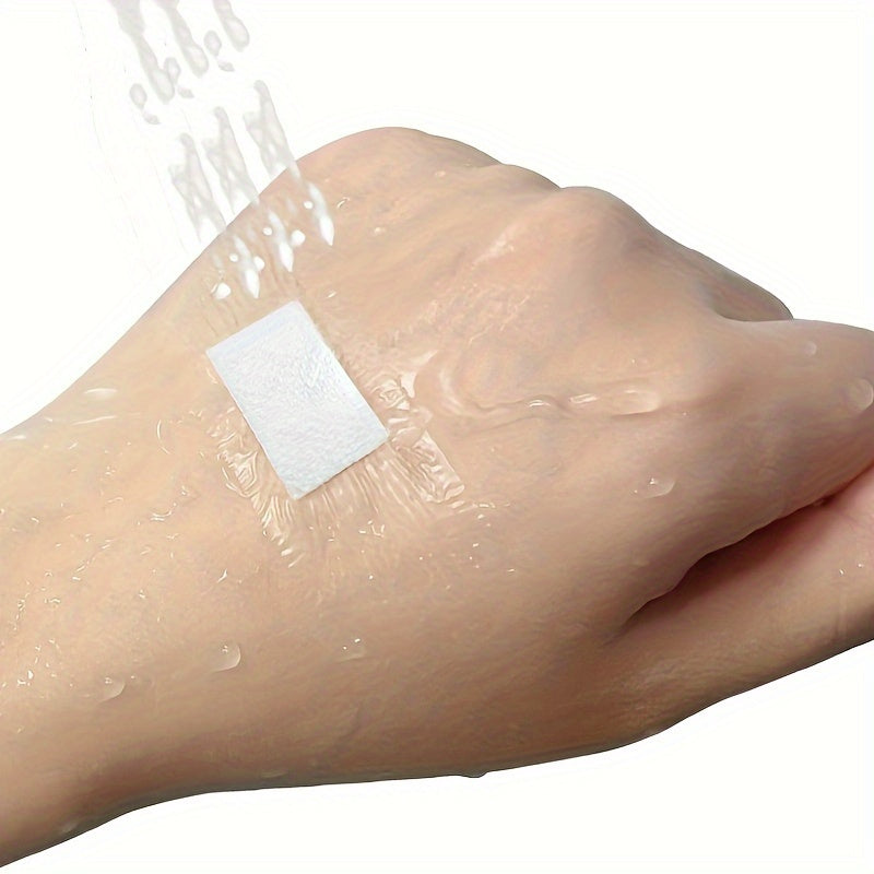 100 waterproof adhesive bandages made of transparent, flexible, non-woven material for bathing, swimming, and outdoor activities.