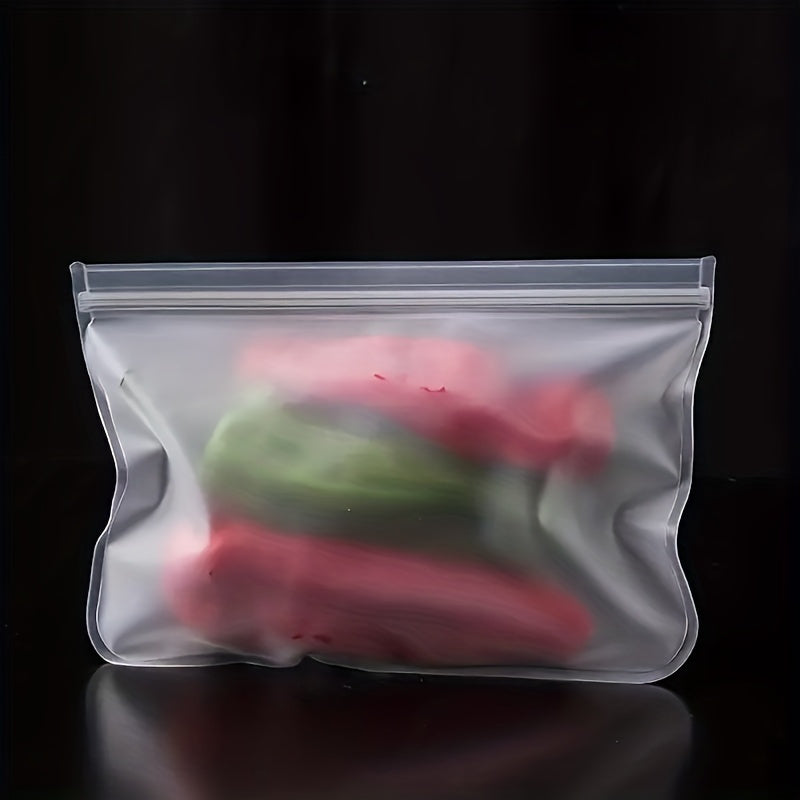 Get 4 Reusable Silicone Food Storage Bags - They're Leakproof, BPA-Free, and Great for Storing Fruits, Vegetables, Sandwiches, and Meats. Perfect for Organizing Your Fridge!