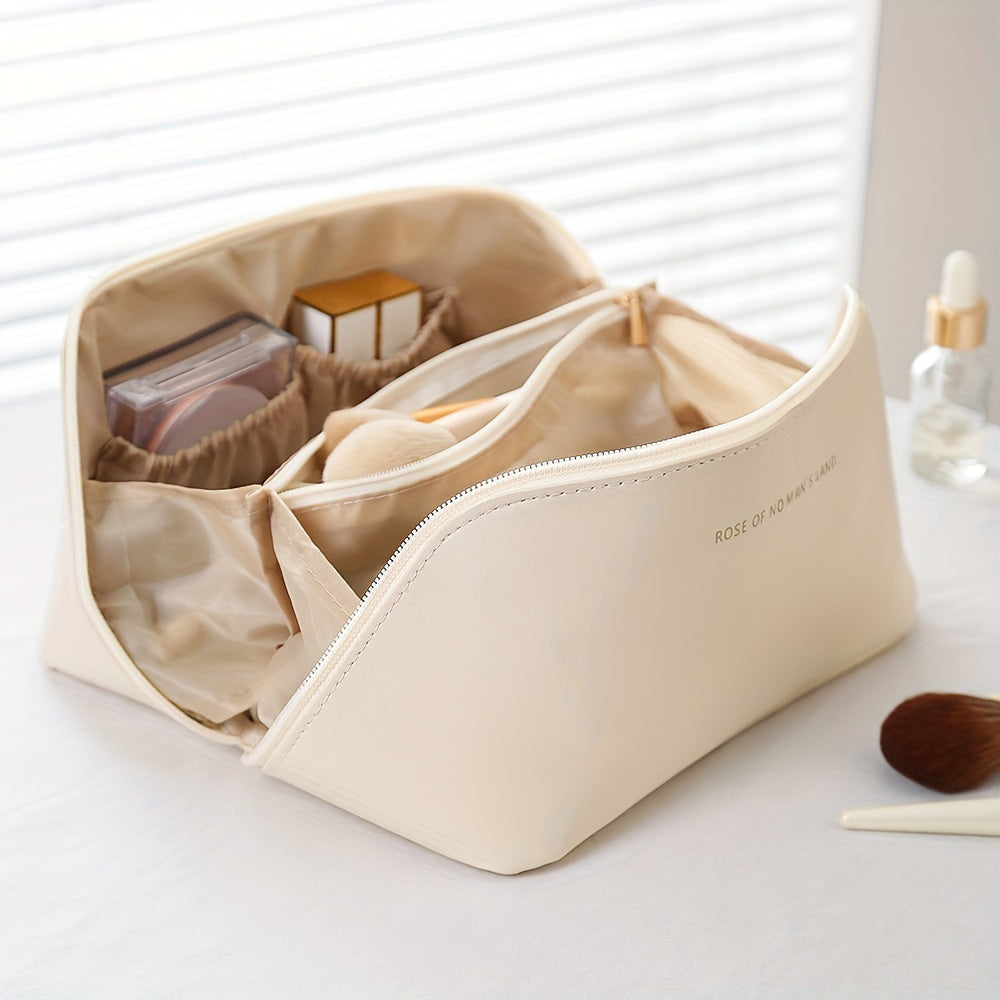 Travel makeup bag with dividers and handle, made of PU material in beige. Multi-compartment storage for skincare and makeup essentials for women.