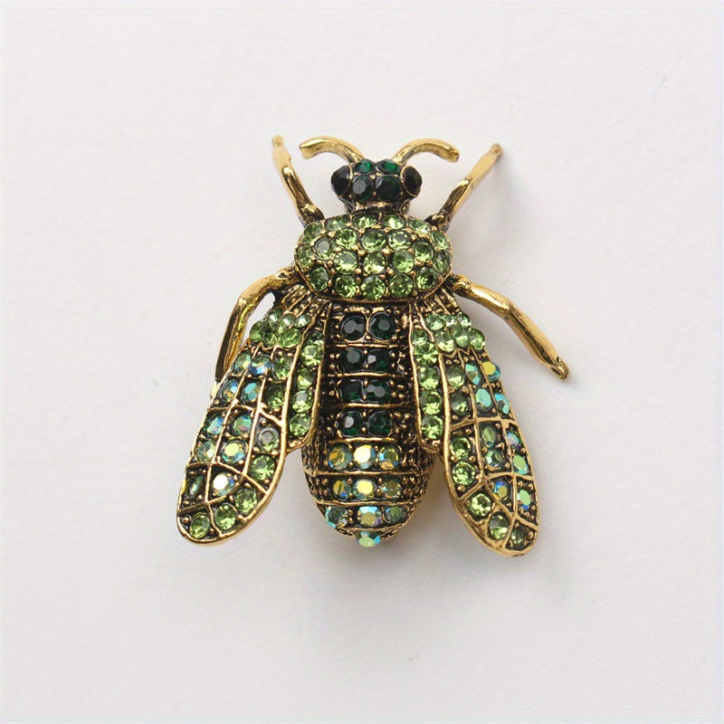 Add a touch of luxury and uniqueness to your accessories with this Vintage Rhinestone Bee Brooch, featuring an irregular shape