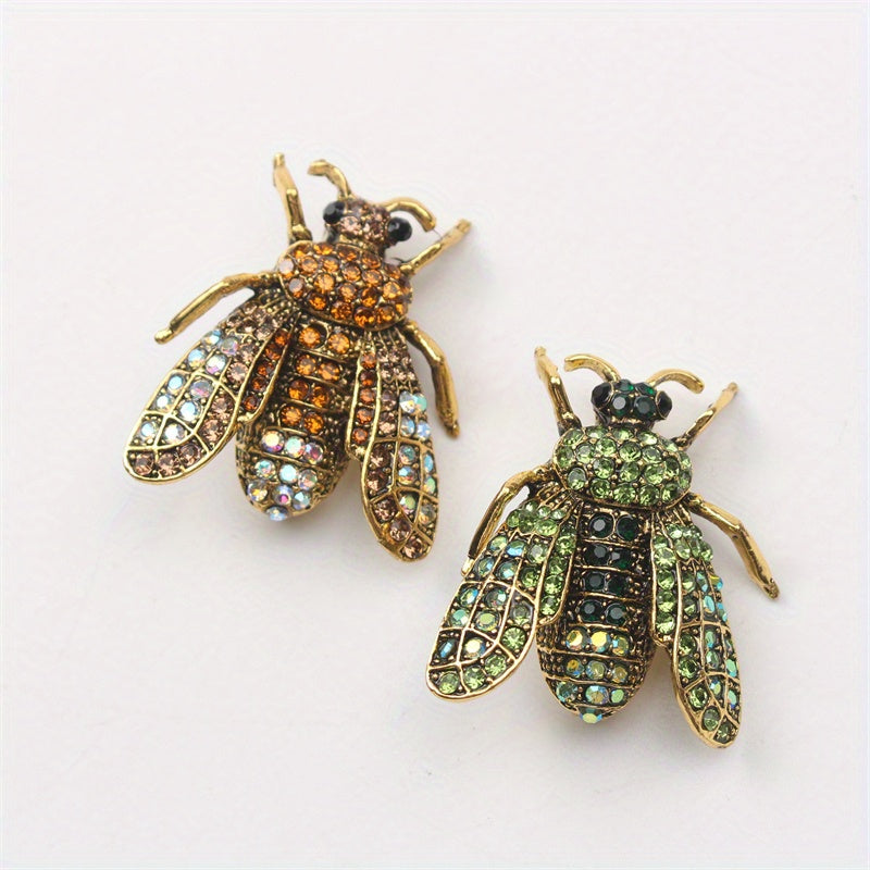 Add a touch of luxury and uniqueness to your accessories with this Vintage Rhinestone Bee Brooch, featuring an irregular shape