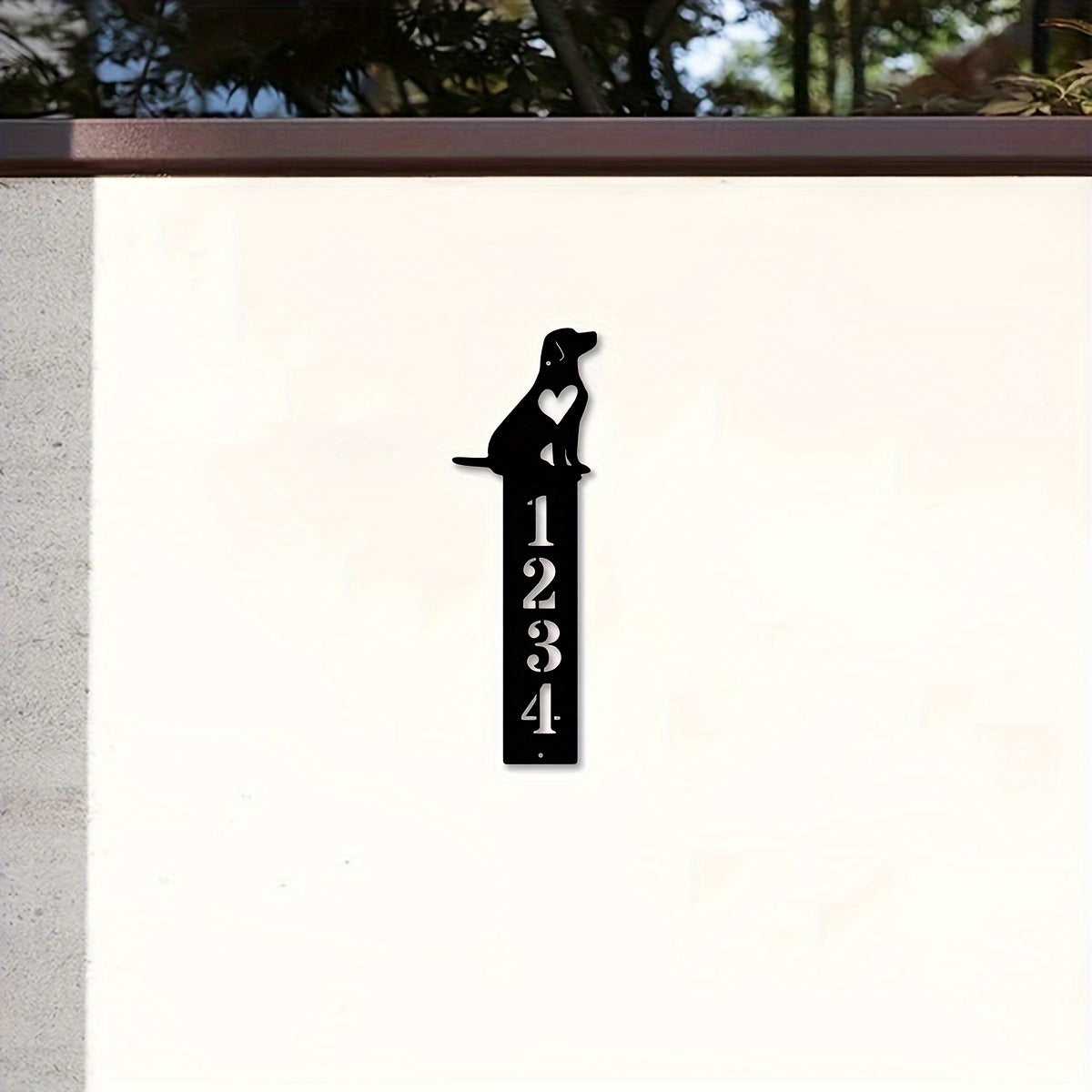 Personalize your home with a custom metal address plaque in black iron. This door number sign can be tailored to your taste and is perfect for hanging in your entryway. Give your home a modern touch with this unique identifier that also makes a great