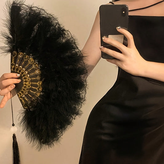 Vintage style decorative feather fan, reminiscent of the 1920s fashion era. This handheld fan is perfect for amplifying clothing, adding flair to dance performances, tea parties, and wedding decor. Crafted from plastic material, this fan is a must-have