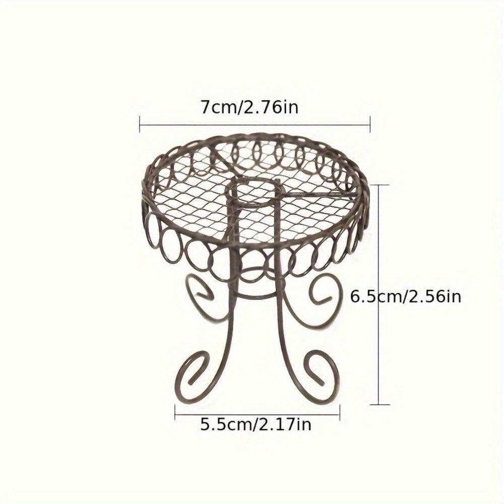 Miniature metal garden and home decor set includes waterproof iron rocking chairs, table, and wireless figurines. No power or batteries required.