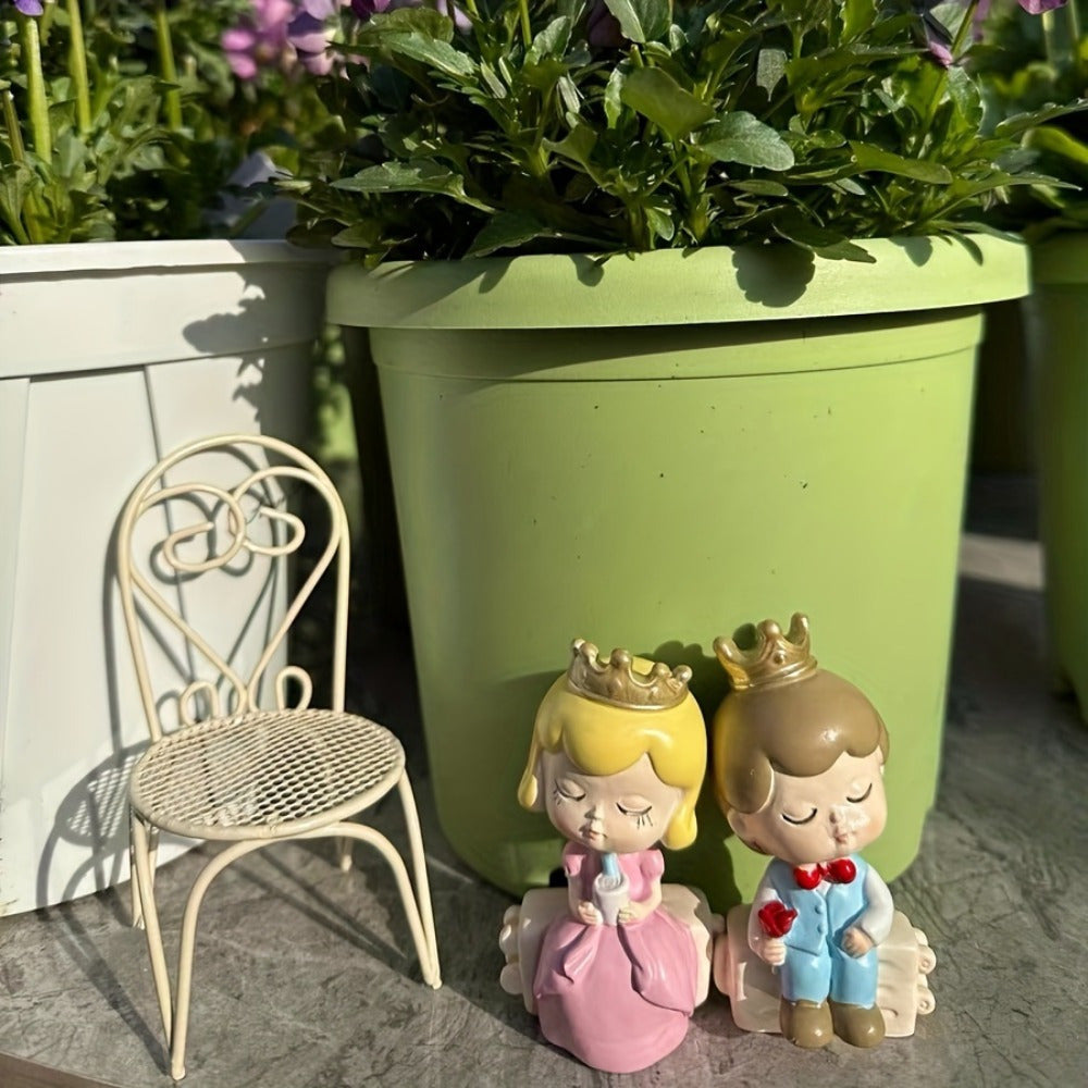 Miniature metal garden and home decor set includes waterproof iron rocking chairs, table, and wireless figurines. No power or batteries required.