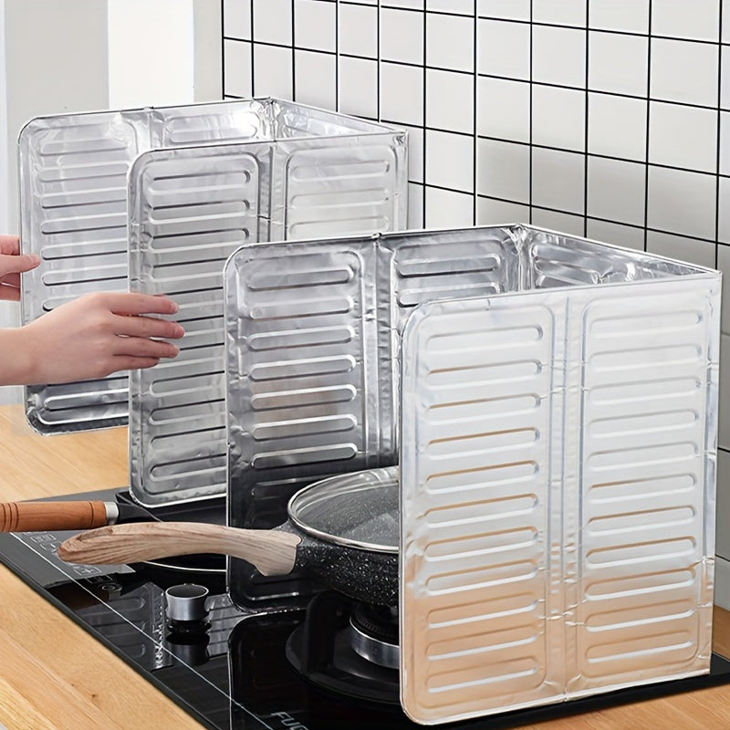 Foldable aluminum oil splash guard for kitchen stove, providing heat insulation and anti-spill protection.