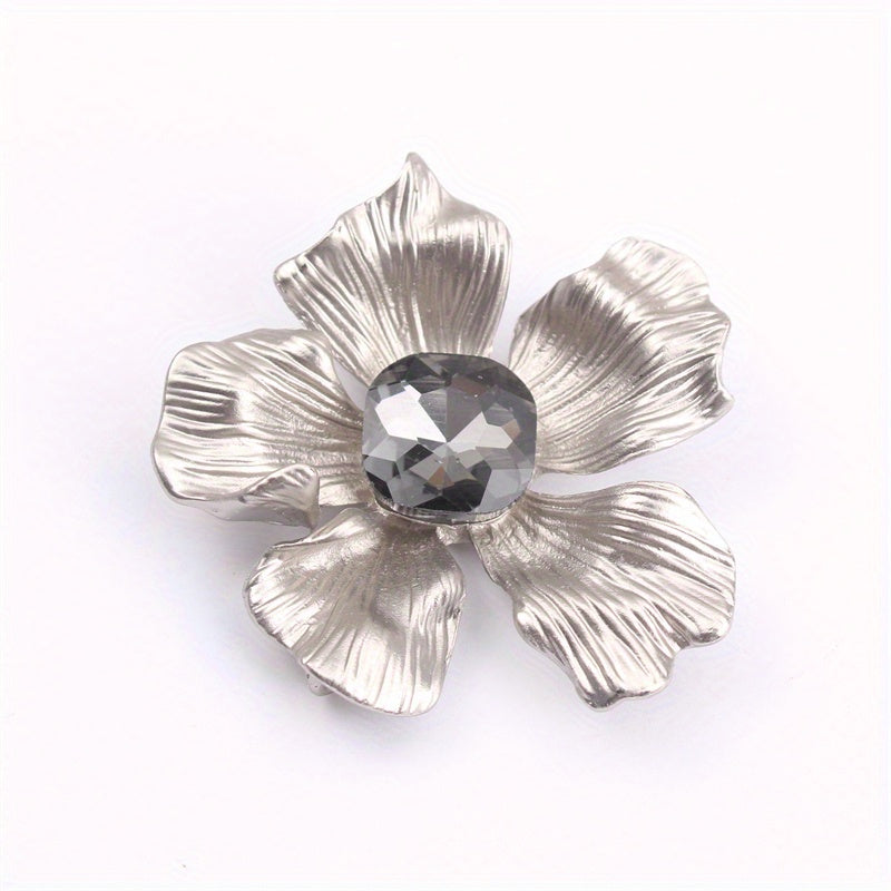 Add a touch of elegance with this luxurious rhinestone flower brooch pin. A versatile accessory that can be used on clothing, bags, and hats to enhance your personal charm for any occasion - whether you're traveling, attending a party, or simply going