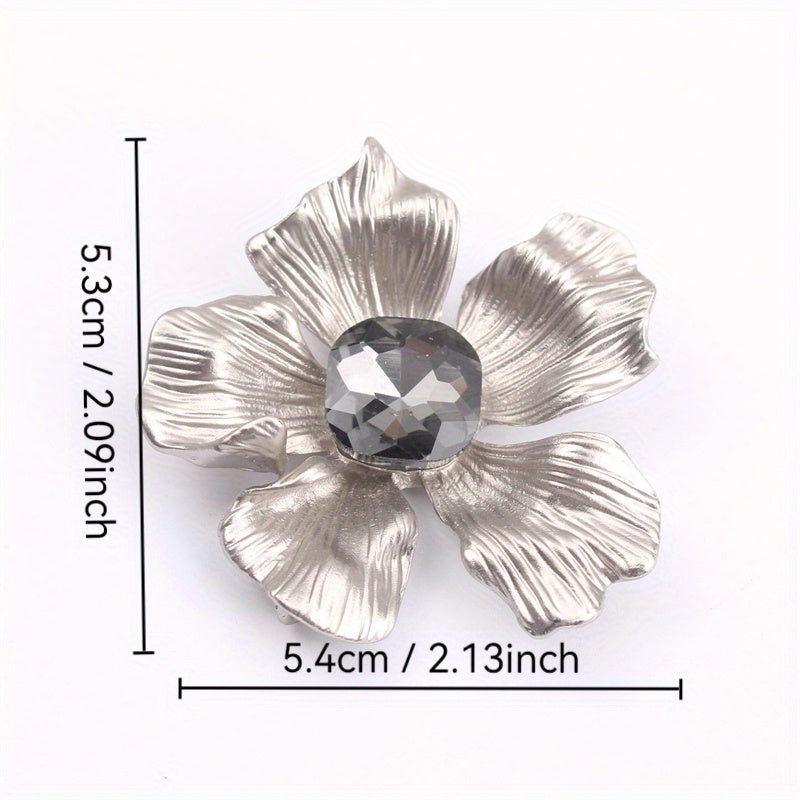 Add a touch of elegance with this luxurious rhinestone flower brooch pin. A versatile accessory that can be used on clothing, bags, and hats to enhance your personal charm for any occasion - whether you're traveling, attending a party, or simply going