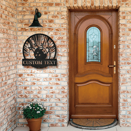 Metal wall art in a vintage bowling silhouette that can be customized, available in black color. Ideal for enhancing home and garden decor.