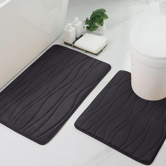 This set includes two bathroom floor mats, perfect for absorbing water and providing traction. These quick-drying, non-slip mats are ideal for use in the bathroom, kitchen, or at the entrance. Available in two colors.