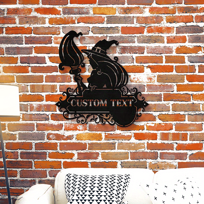 Decorate your home with a custom metal door hanger featuring a black witch and cat silhouette. Personalize it with your family name for a unique touch. This durable iron hanging art is perfect for Halloween and outdoor patio decor. Suitable for the