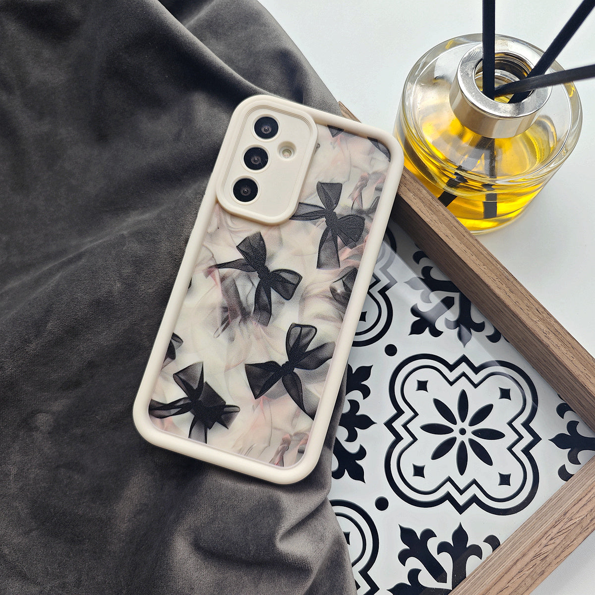 Translucent bow black full screen soft shell phone case for Samsung and iPhone models.