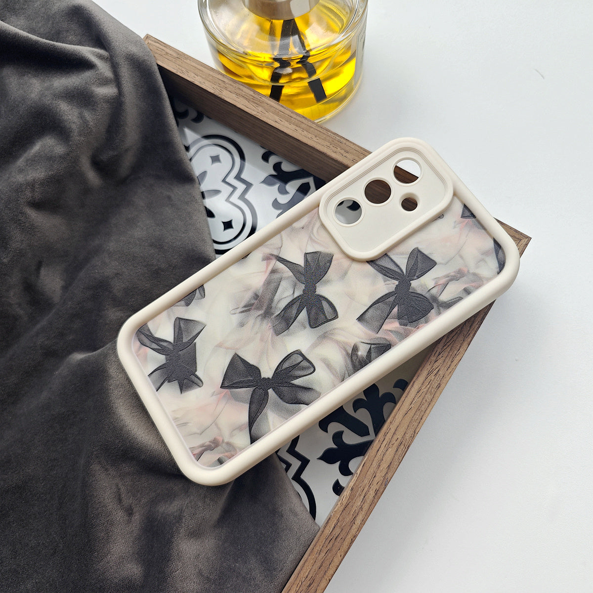 Translucent bow black full screen soft shell phone case for Samsung and iPhone models.