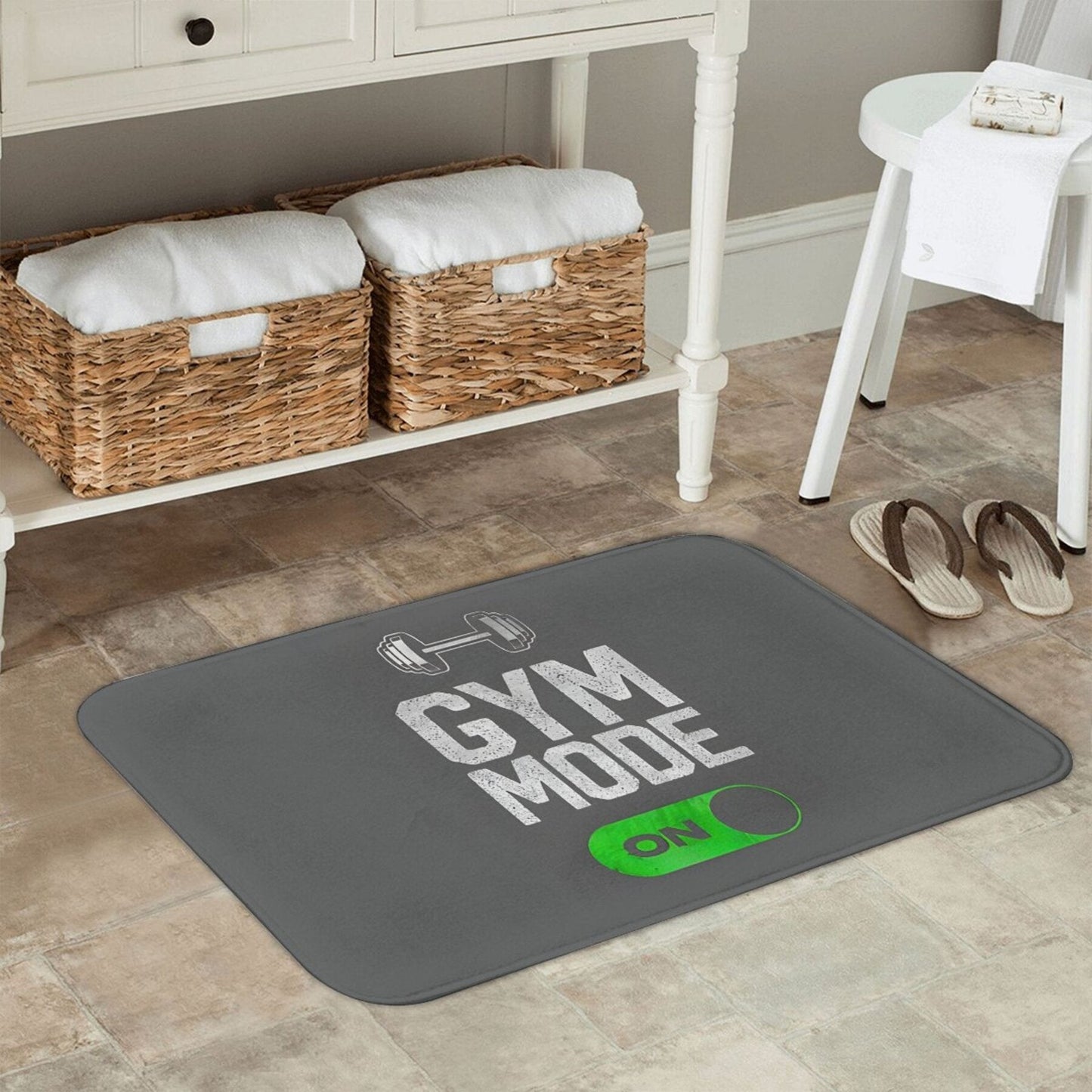 Polyester doormat with non-slip backing that is machine washable. Features a "Gym Mode Activated" design, suitable for bathroom, kitchen, and entrance. This lightweight rectangular floor mat is perfect for home decor.