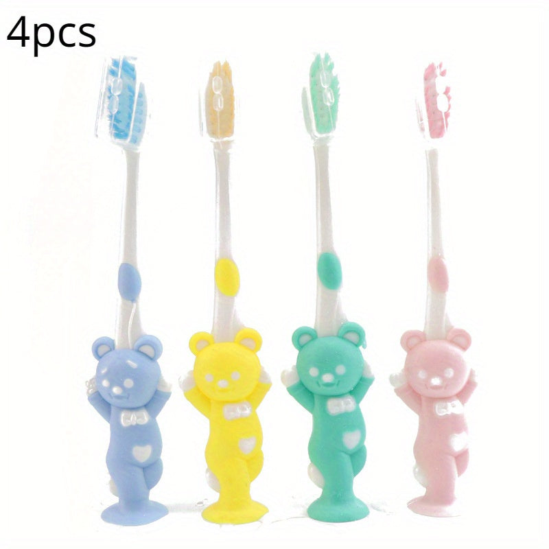 4 soft bristle toothbrushes with bamboo charcoal in cute rabbit and bear designs, pastel colors, and short handles for effective teeth care.