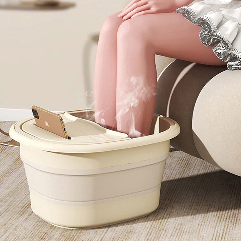 Portable foot soak tub with massage and easy-carry design for home spa experience.