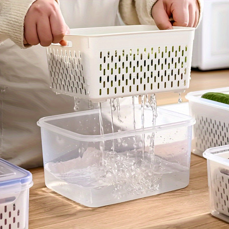 Durable plastic kitchen organizer, the 2-in-1 Refrigerator Storage Bin features a double layer draining basket with lid. This multifunctional container is ideal for storing fruits, vegetables, and meat, keeping them fresh in a transparent sealed box.