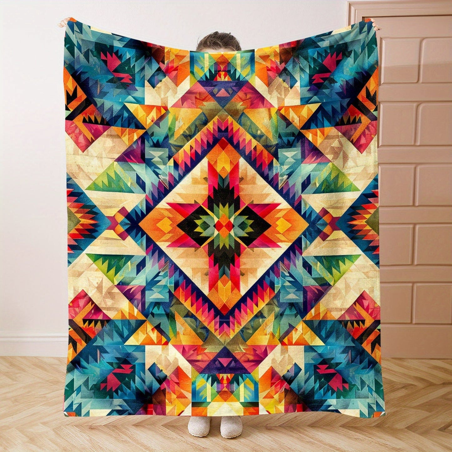 Soft and lightweight Aztec-inspired digital print flannel throw blanket suitable for all-season comfort on your bed, sofa, office, camping, or while traveling. Made of knitted polyester, with a contemporary style and weighing between 200-250gsm.