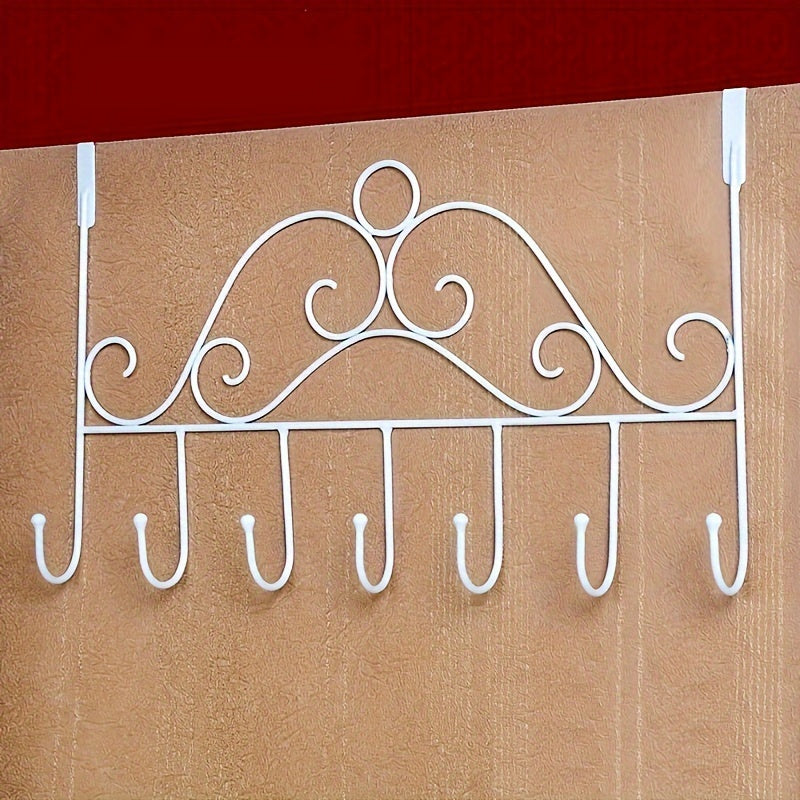 Simple over-the-door metal storage rack with hooks for coats, keys, and umbrellas. Easy to install without drilling. Great for entryway, bedroom, bathroom, or kitchen. Casual style door