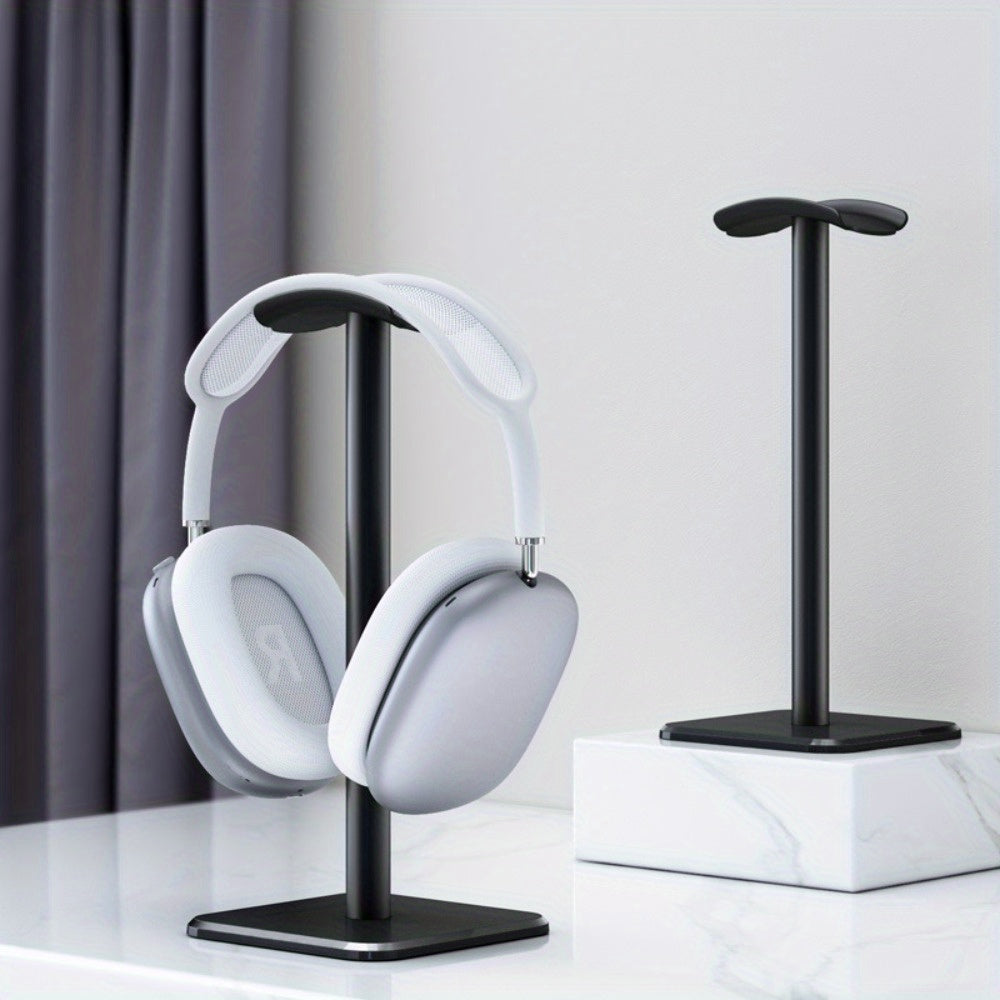 Aluminum headphone stand for gaming earphones with durable matte finish, also functions as a rectangular desk organizer for office desktop.