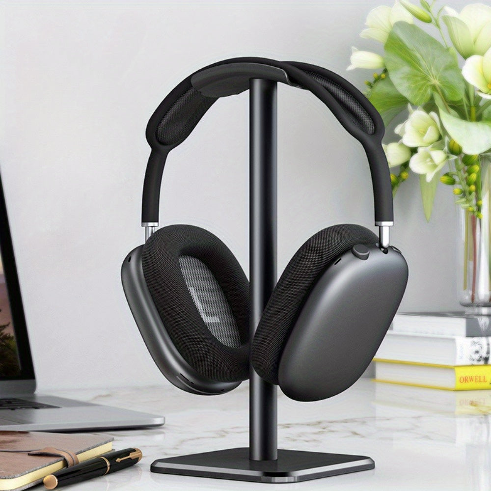 Aluminum headphone stand for gaming earphones with durable matte finish, also functions as a rectangular desk organizer for office desktop.