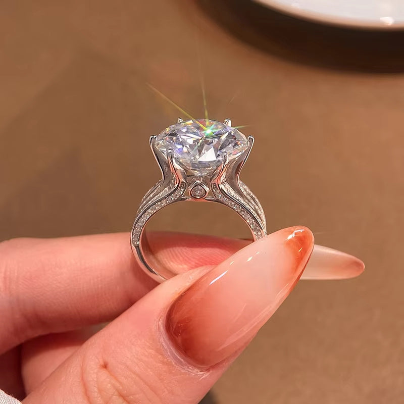 Introducing the Shavano 925 Sterling Silver Moissanite Ring, featuring a stunning 10 Carat Round Cut stone in a fashionable Bohemian style. This hypoallergenic and durable ring is perfect for daily wear or as a thoughtful gift. With a weight of 6.7g and