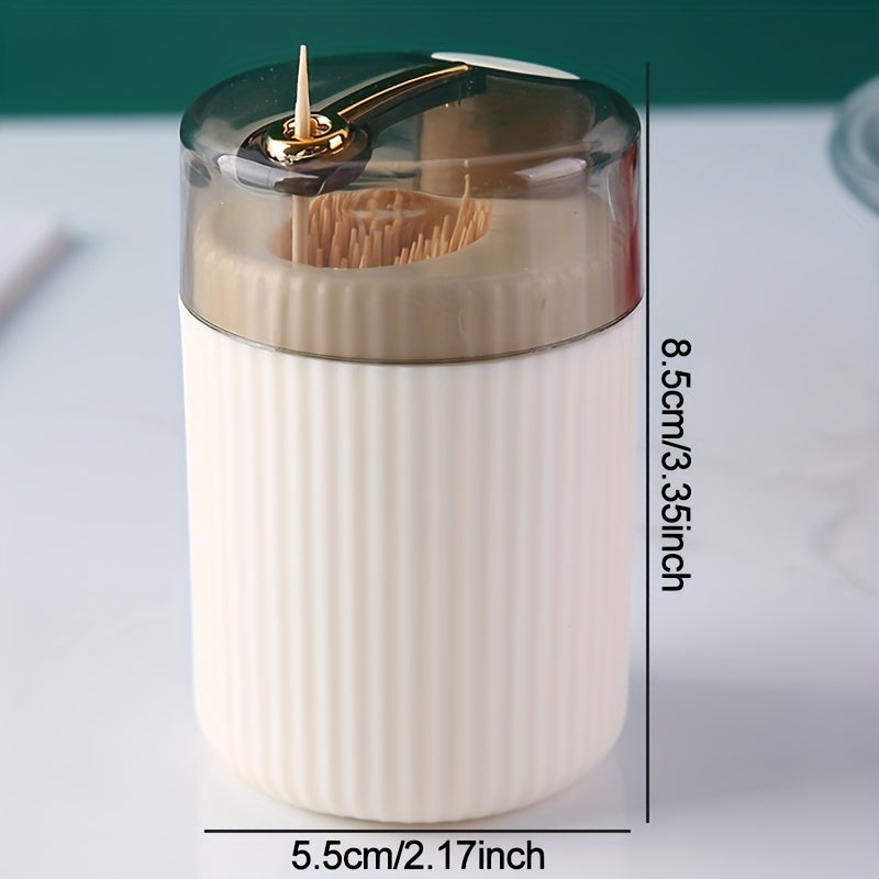 Automatic toothpick dispenser; no power needed. Press button for easy access on kitchen or dining table. Made of plastic.