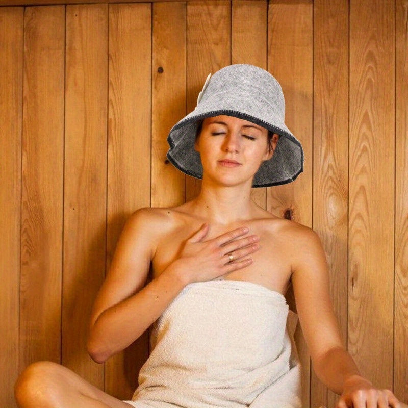 Absorbent and heat-resistant sauna cap for hot springs and steam rooms, providing comfortable shower experience.