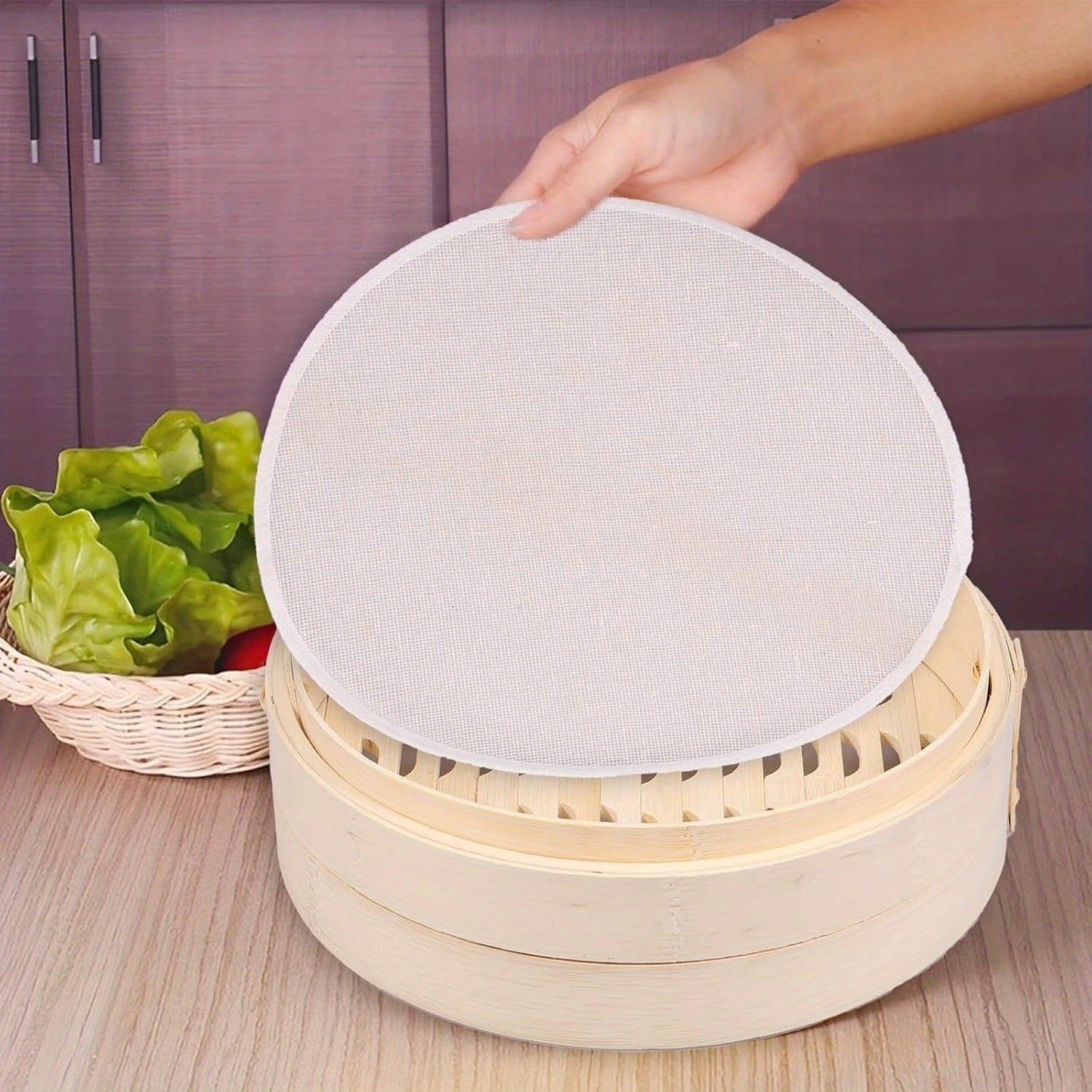 Handmade Bamboo Dumpling Steamer with a 25.4 cm Bamboo Steamer Basket, featuring 2 Cages and 1 Cover. This Lightweight Food Steamer is perfect for Steaming Dumplings, Vegetables, Fish, and Rice. Add a touch of decor to your kitchen with this Bamboo