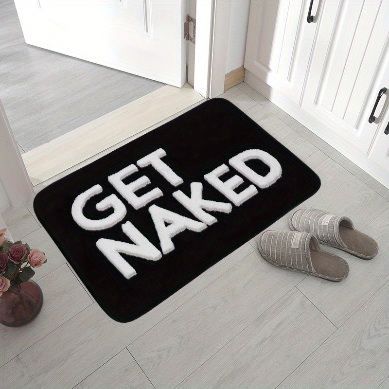 Soft and luxurious microfiber bath mat featuring anti-slip backing. Made of 100% polyester, this mat is machine washable and plush, with a playful "Get Naked" design. Perfect for use in the bathroom, bedroom, living room, kitchen, or at the entrance of